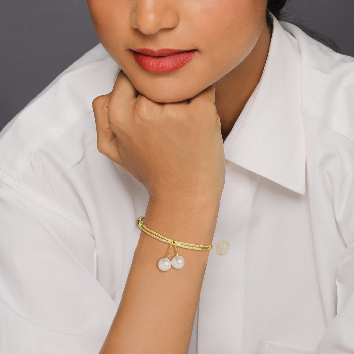 Golden Dangling Pearl Bangle Bracelet