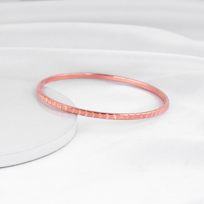 Rose Gold Linear Cuts Bangle